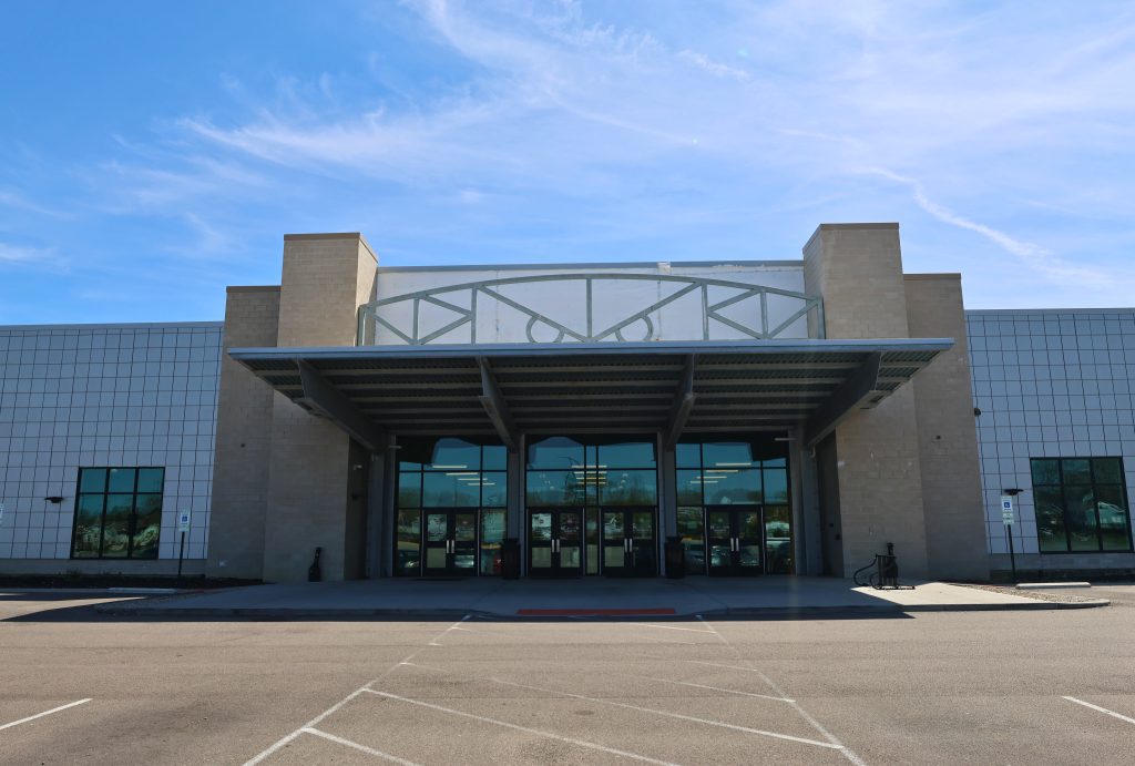 Spooky Hollow Hamilton Oh Entrance Front entrance of Spooky Nook Sports at Champion Mill in Hamilton, Ohio, with large glass doors, a canopy awning, and contemporary industrial architecture.